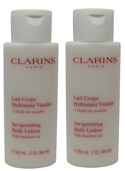 Clarins Invigorating Body Lotion Lot of 2 Bottles each 2oz. Total of 4oz